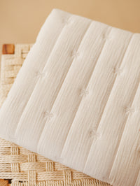 Quilted muslin / Embroidered bows