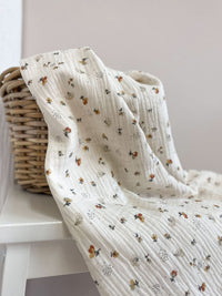 Muslin / pastel flowers + hedgehogs